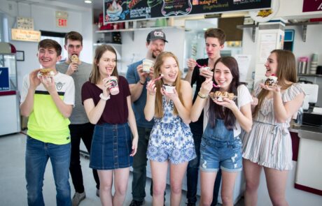 Group of customers posing with ice cream at Sugar Bowl in Decorah, Iowa
